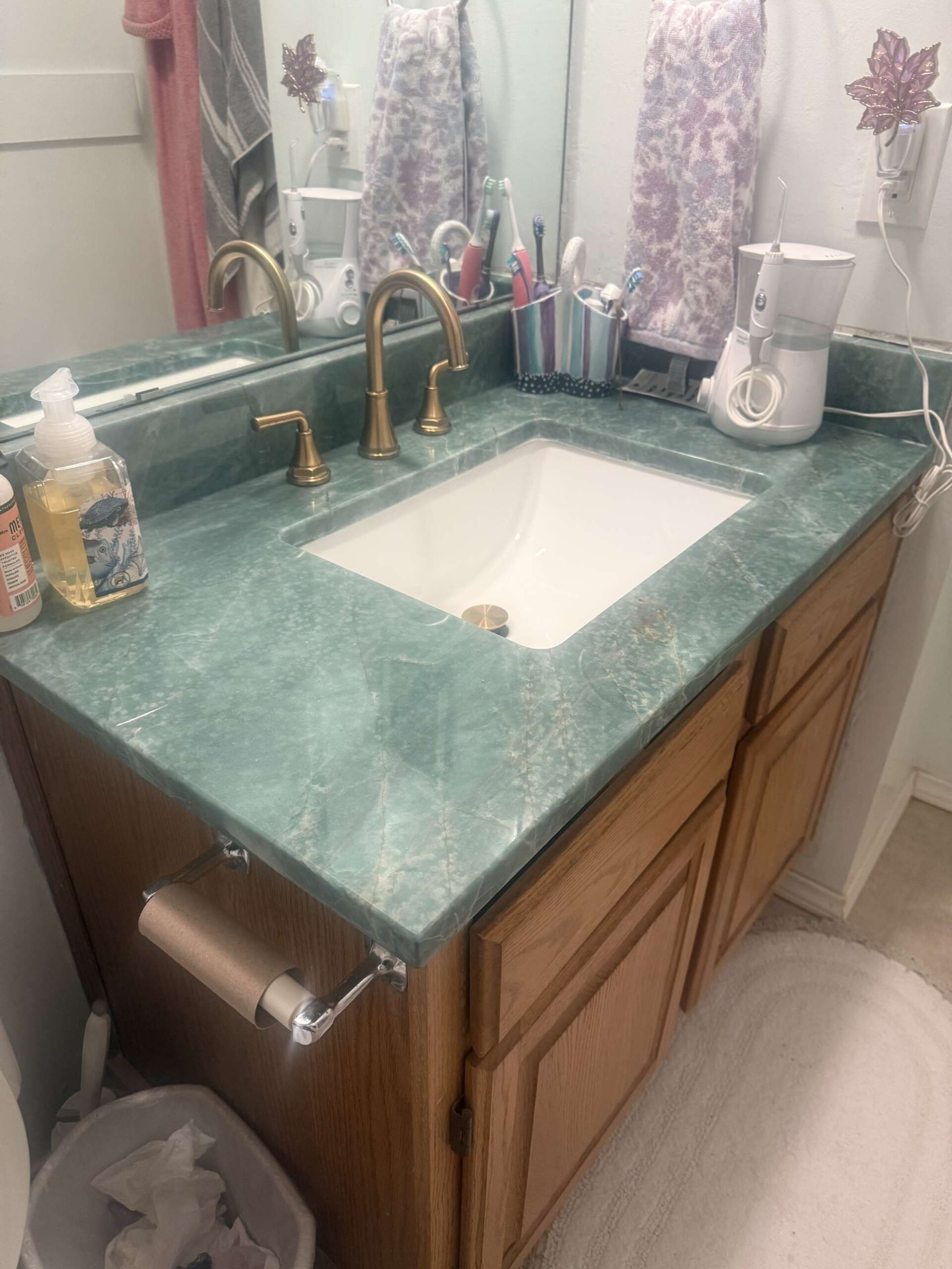 Green quartzite bathroom vanity with undermount sink, Austin TX