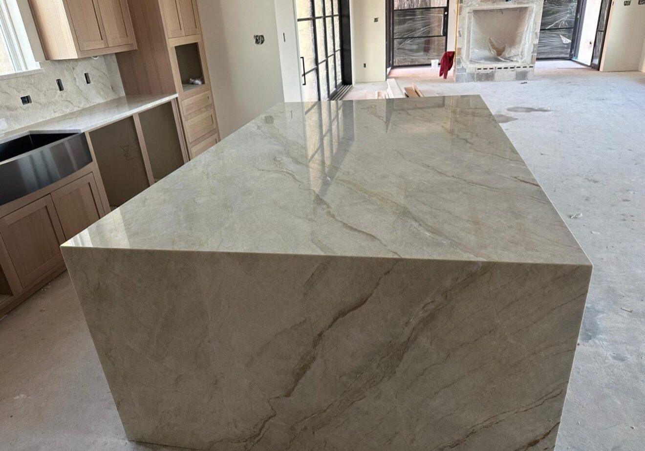 Taupe quartzite island with mitered waterfall edges, Austin TX